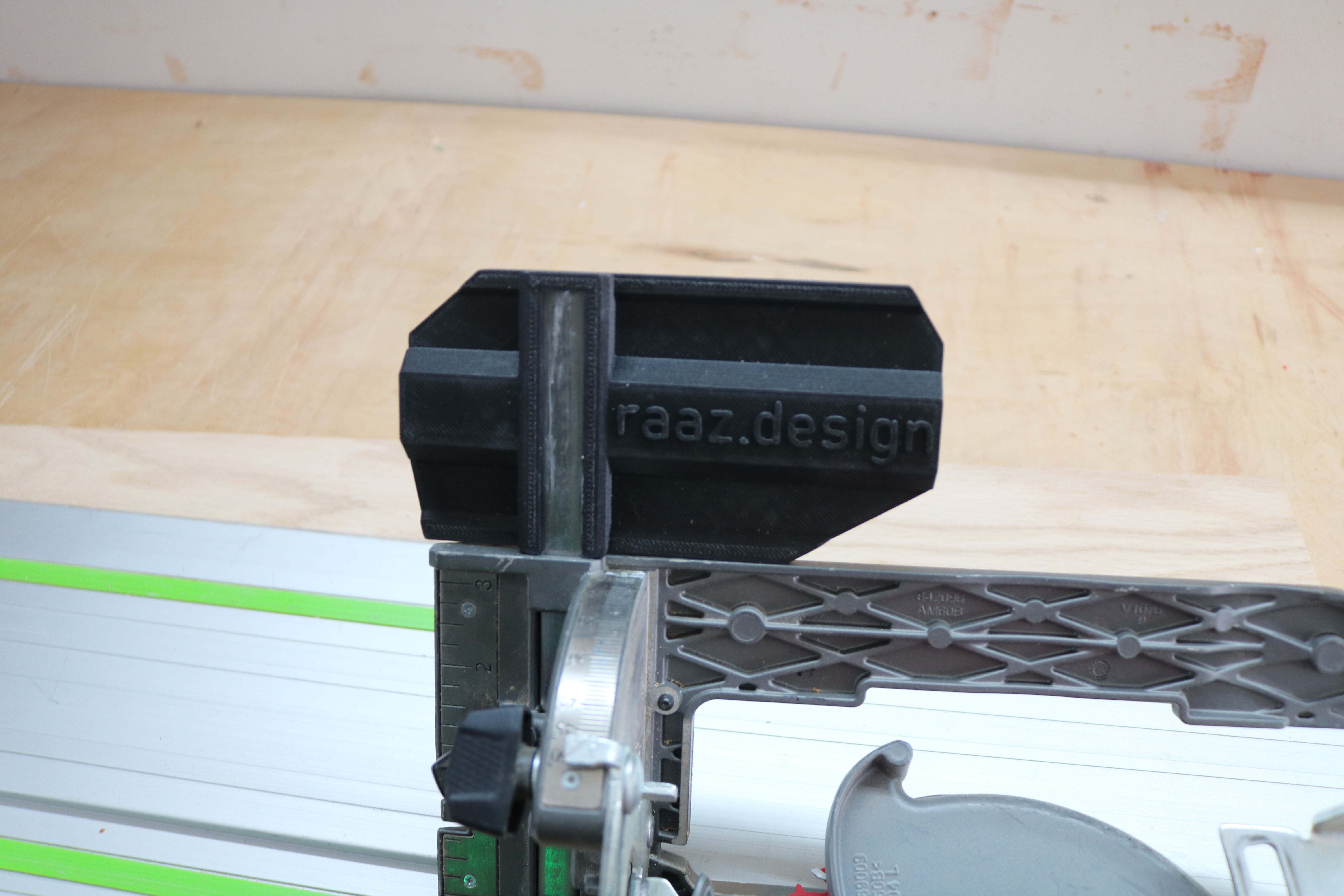 Track saw guide installed in saw